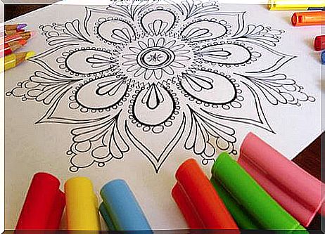 Painting mandalas is one of the activities to do as a family at home.