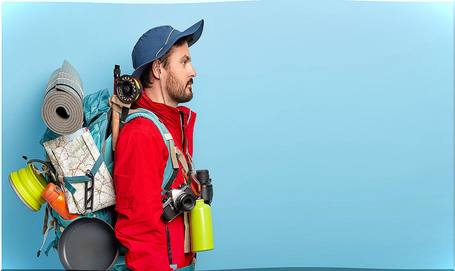 Boy who knows well how to pack his backpack for hiking.