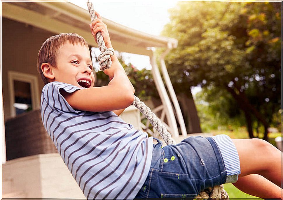 Happy child playing outdoors.