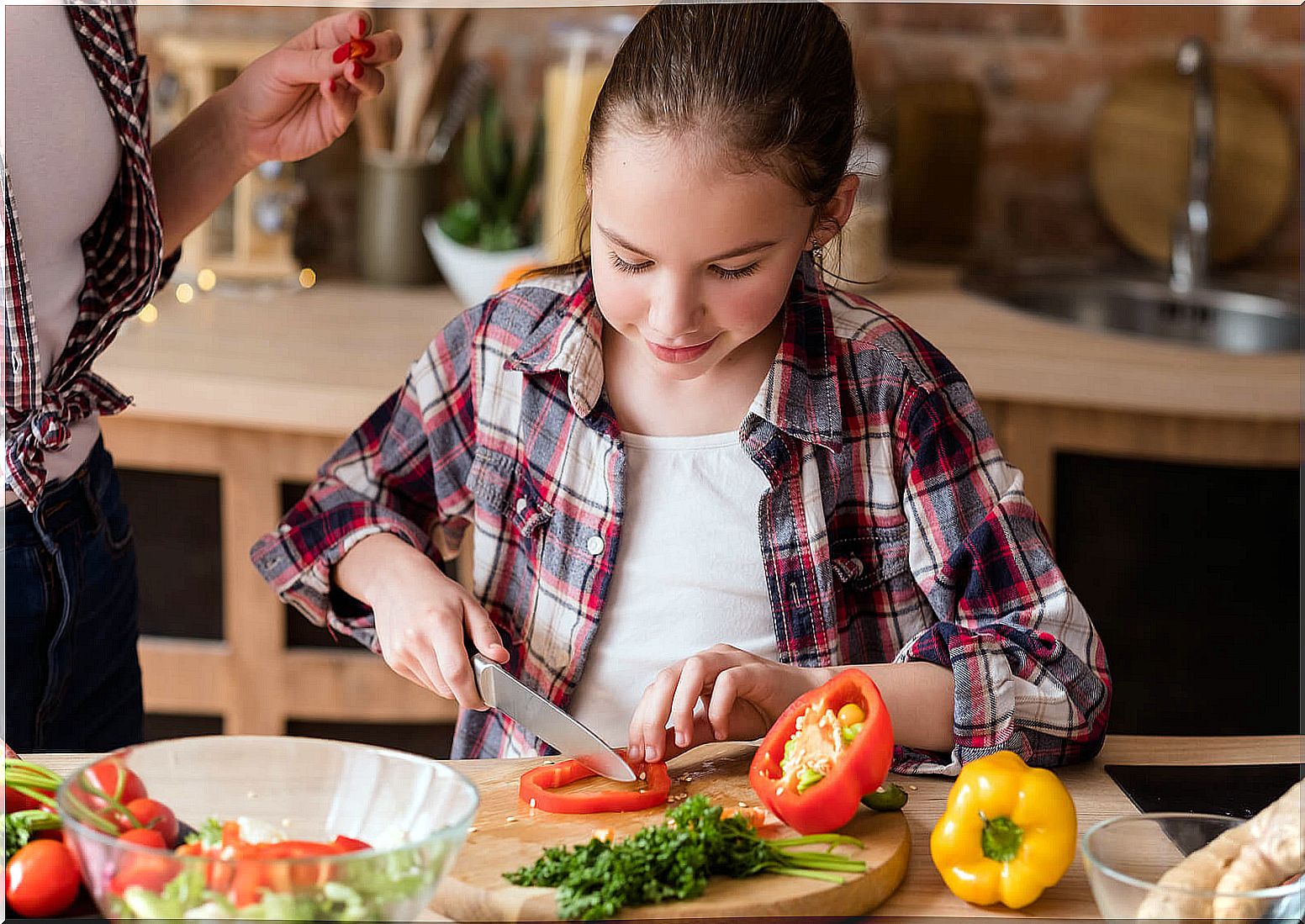 Vegan teen girl preparing food.