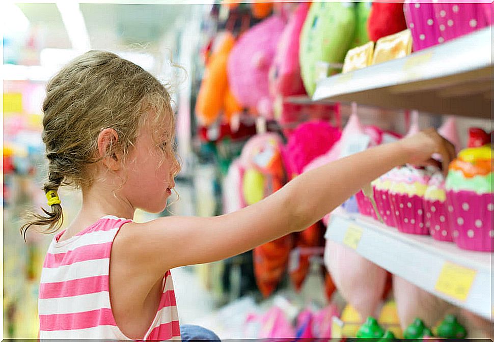 Girl buying toys compulsively.