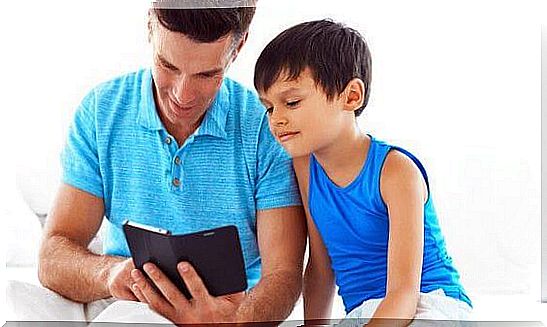 Father and son watching Youtube kids