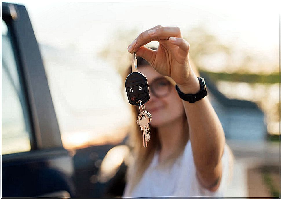 Daughter with the car keys to learn to drive.