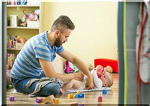 Father and son playing at home